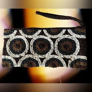Vintage beaded wristlet in multi color circle design with chocolate brown lining